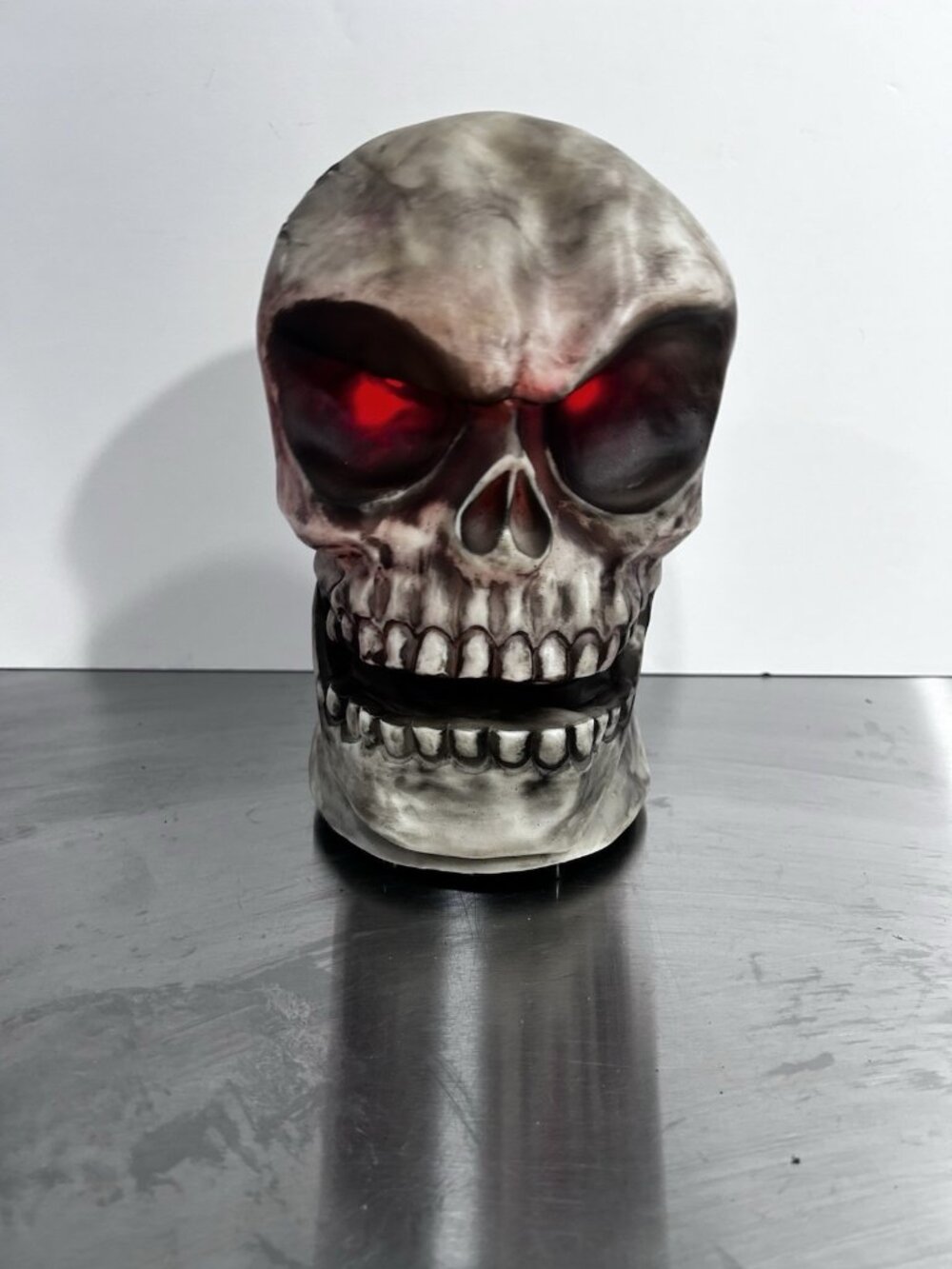 Pan Asian Creations Animated Motion Sensor Lighted Singing Skull 2014 Halloween